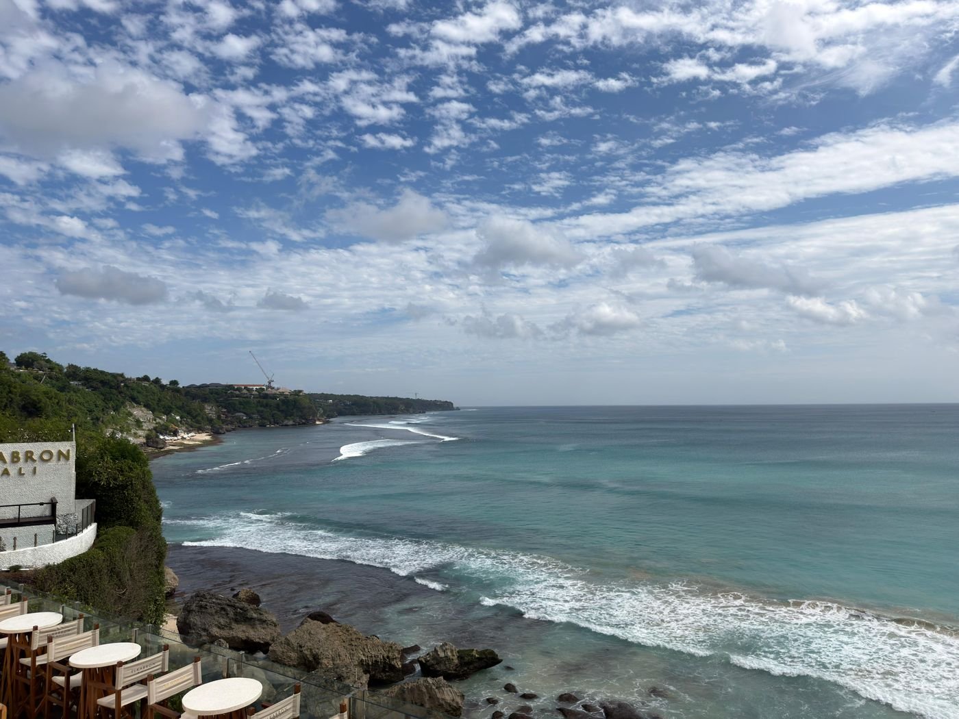 Bingin Beach Uluwatu Bali — cliffside view over the reef break and turquoise water