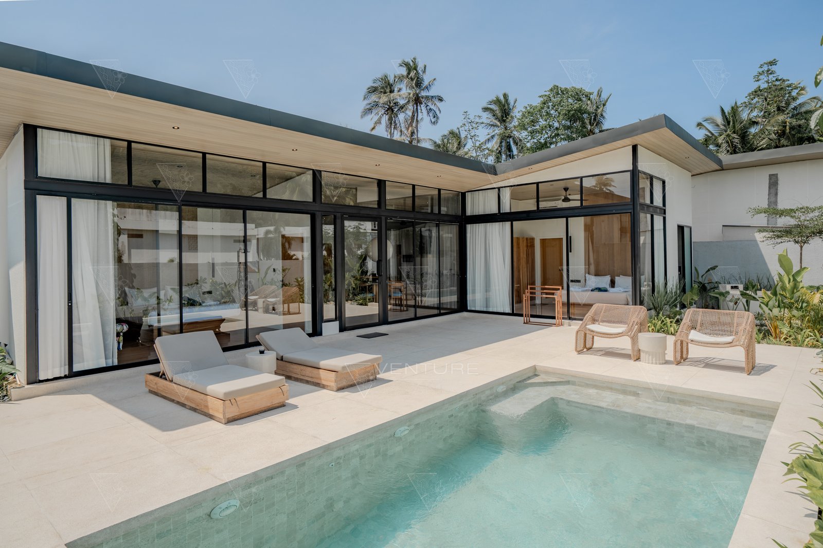 Aerial view of Sukacita Hill private villa in Uluwatu Bali green jungle hills